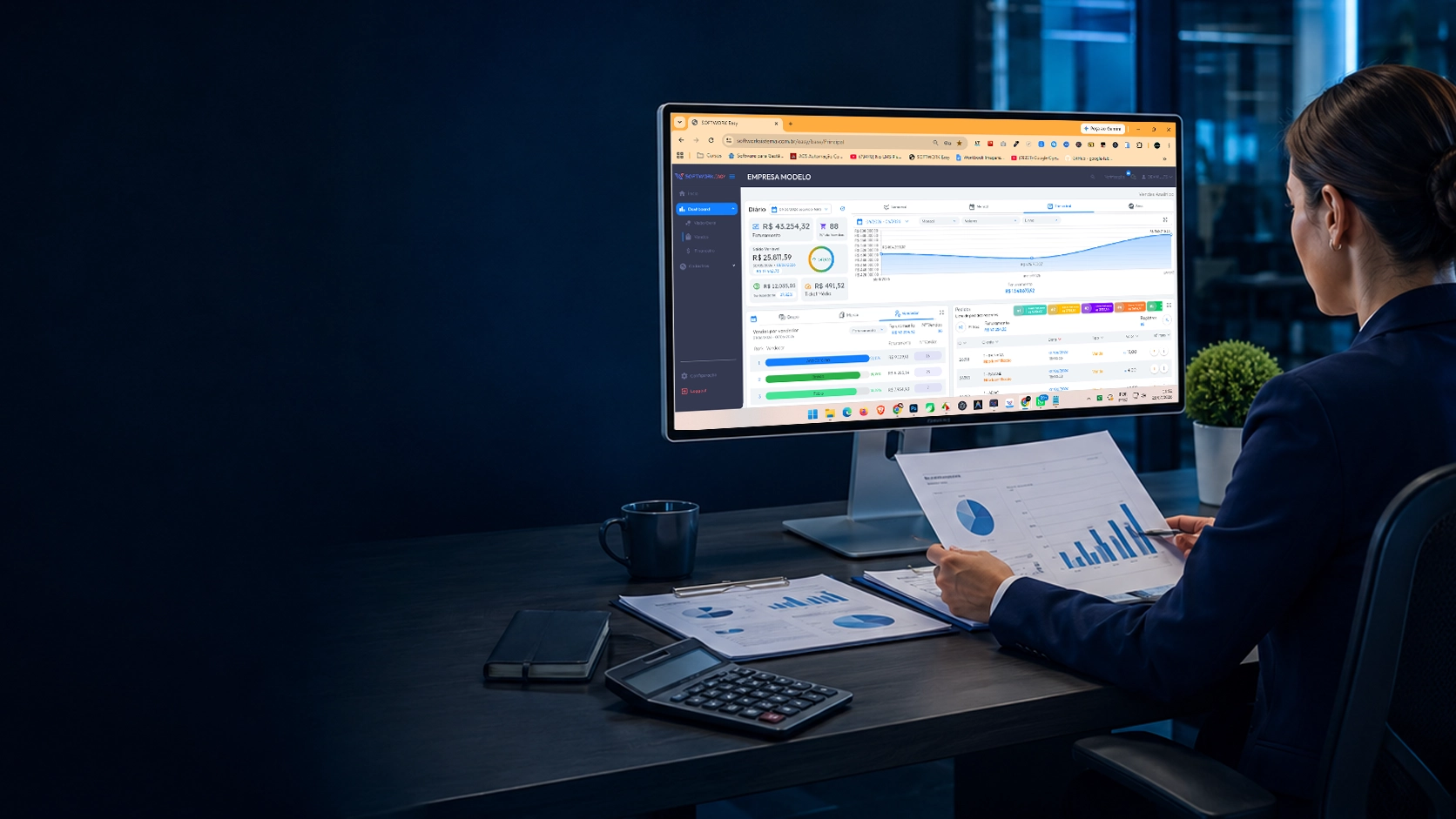Profissional consultando relatórios financeiros no sistema Softwork